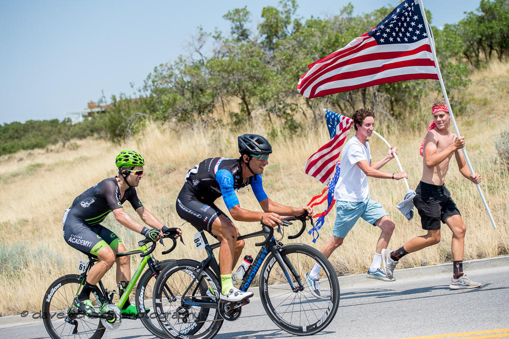 Enthusiastic flag bearers inspire the riders on the steep climb up Bountiful Bench. Stage 5, Layton to Bountiful,  2017 LHM Tour of Utah (Photo by Dave Richards, daverphoto.com)