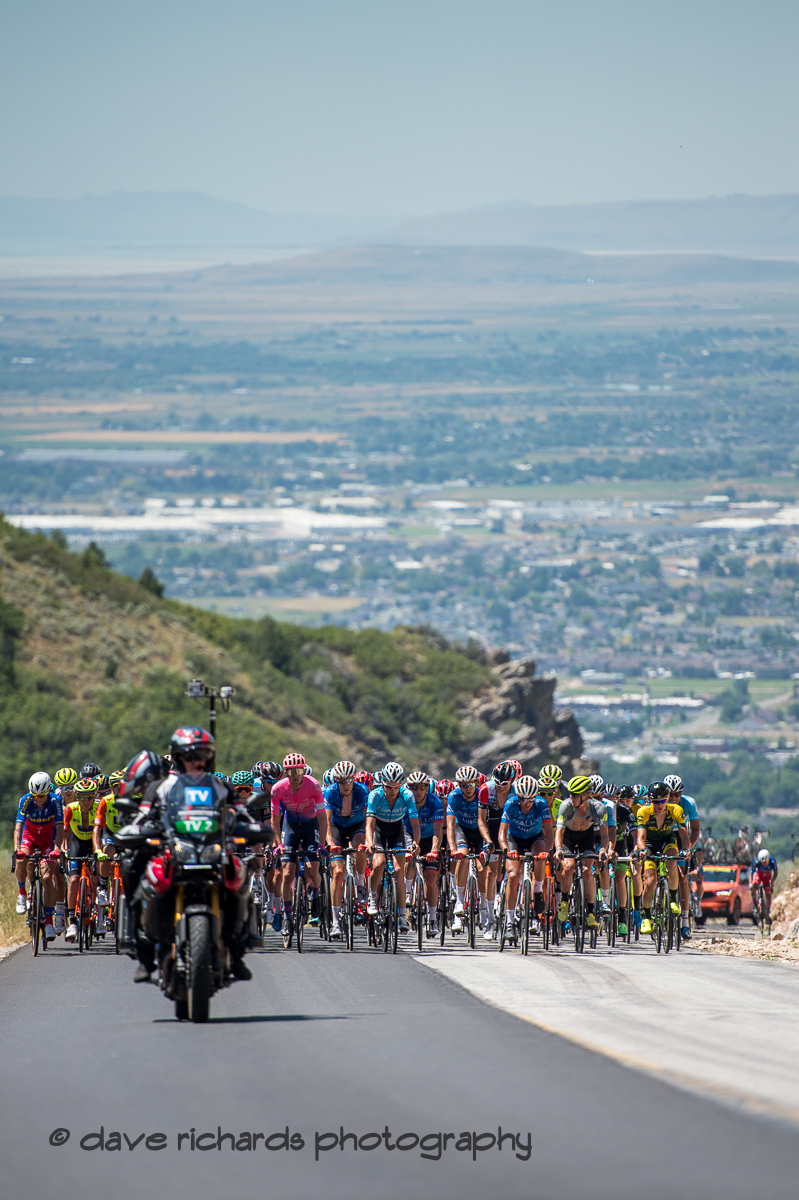 The peloton climbs high above the valley below on North Ogden Pass. Stage 2 - Brigham City to Powder Mountain Resort, 2019 LHM Tour of Utah (Photo by Dave Richards, daverphoto.com)