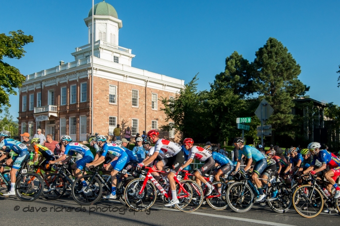 The pelton makes the turn at the top of the State Street climb. Stage 4 - Salt Lake City Circuit Race, 2019 LHM Tour of Utah (Photo by Dave Richards, daverphoto.com)