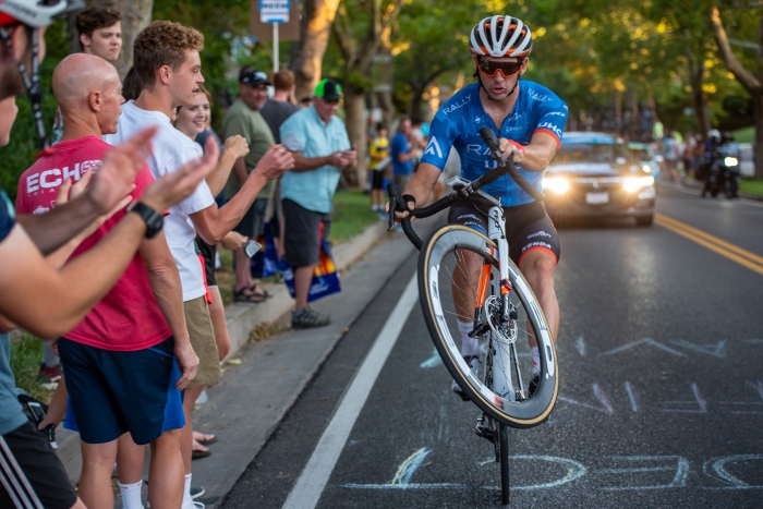 Ty Magner (Rally UHC Cycling) rides a wheelie up State Street. Stage 4, 2019 Tour of Utah. Photo by Steven L. Sheffield