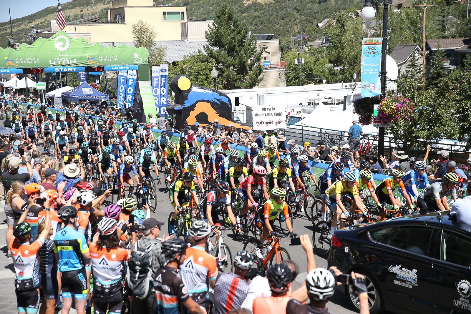 Fans of cycling an cyclists themselves rode out to watch the neutral parade laps at the start of Stage 6 in Park City.