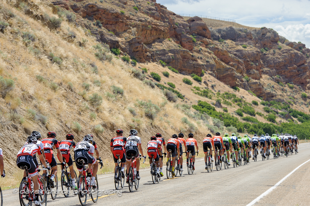 The peloton stretches out under sandstone outcroppings above Echo, Utah. Stage 6, 2016 Tour of Utah. Photo by Dave Richards, daverphoto.com