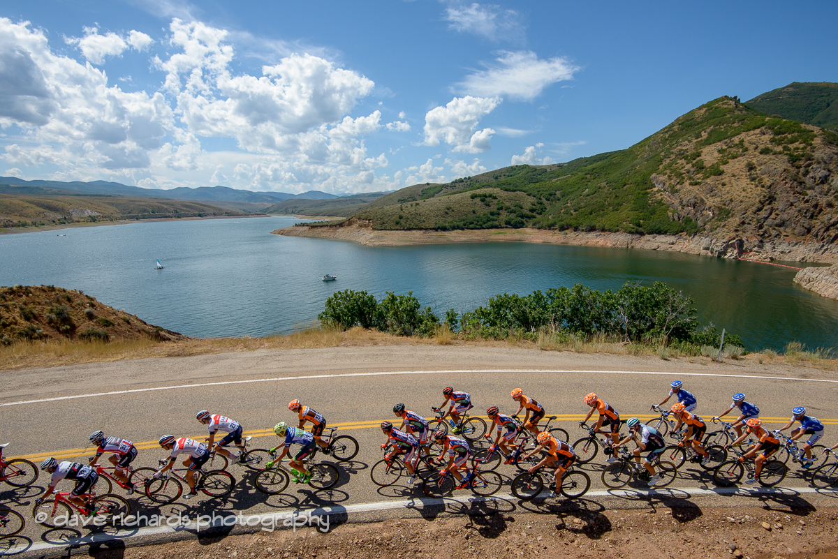 The peloton rolls along East Canyon Reservoir. Stage 6, 2016 Tour of Utah. Photo by Dave Richards, daverphoto.com