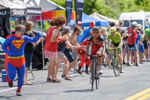 Superman cheers on Atapuma (BMC Racing) along Tanner's Flat on the climb to Snowbird. Stage 6, 2016 Tour of Utah. Photo by Dave Richards, daverphoto.com