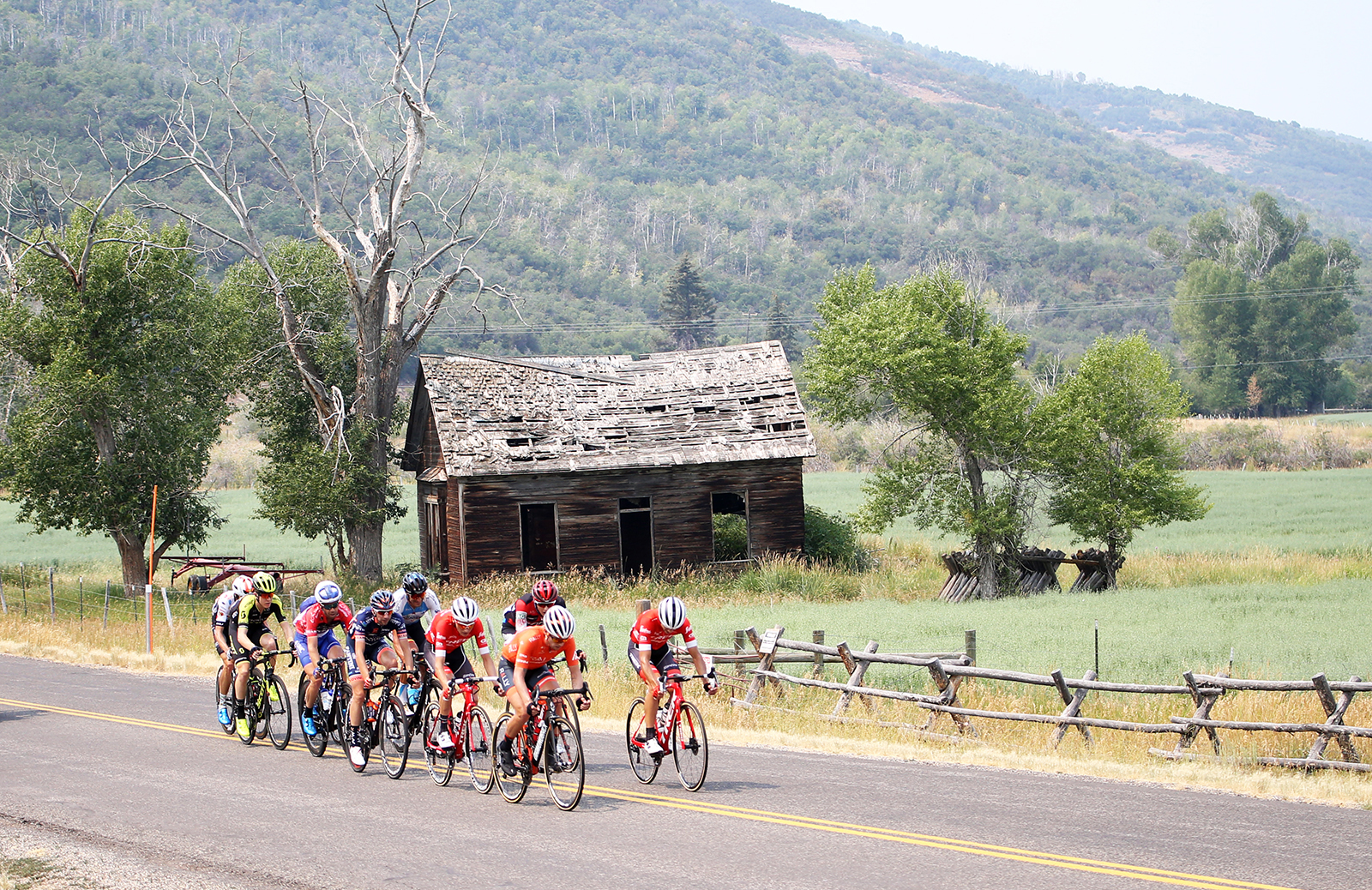 The break rides through the Park City country roads.  Stage 5 of the 2018 Tour of Utah, August 10, 2018. Photo by Cathy Fegan-Kim, www.cottonsoxphotography.net