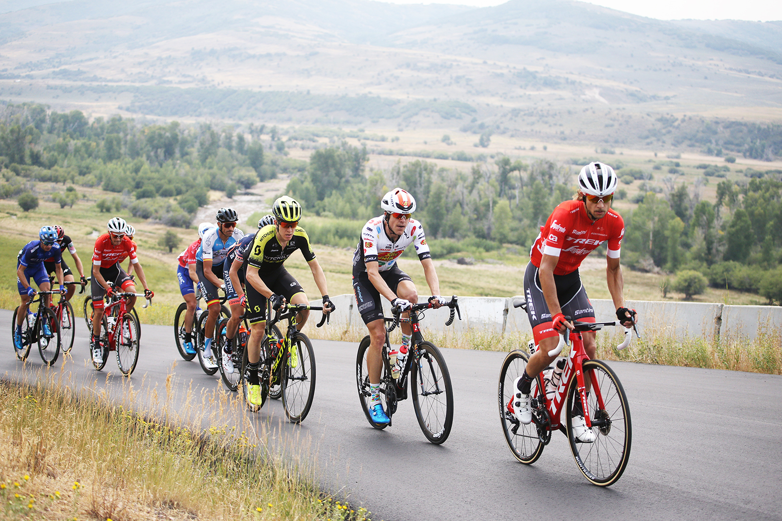 The break heads towards the gravel section.  Stage 5 of the 2018 Tour of Utah, August 10, 2018. Photo by Cathy Fegan-Kim, www.cottonsoxphotography.net