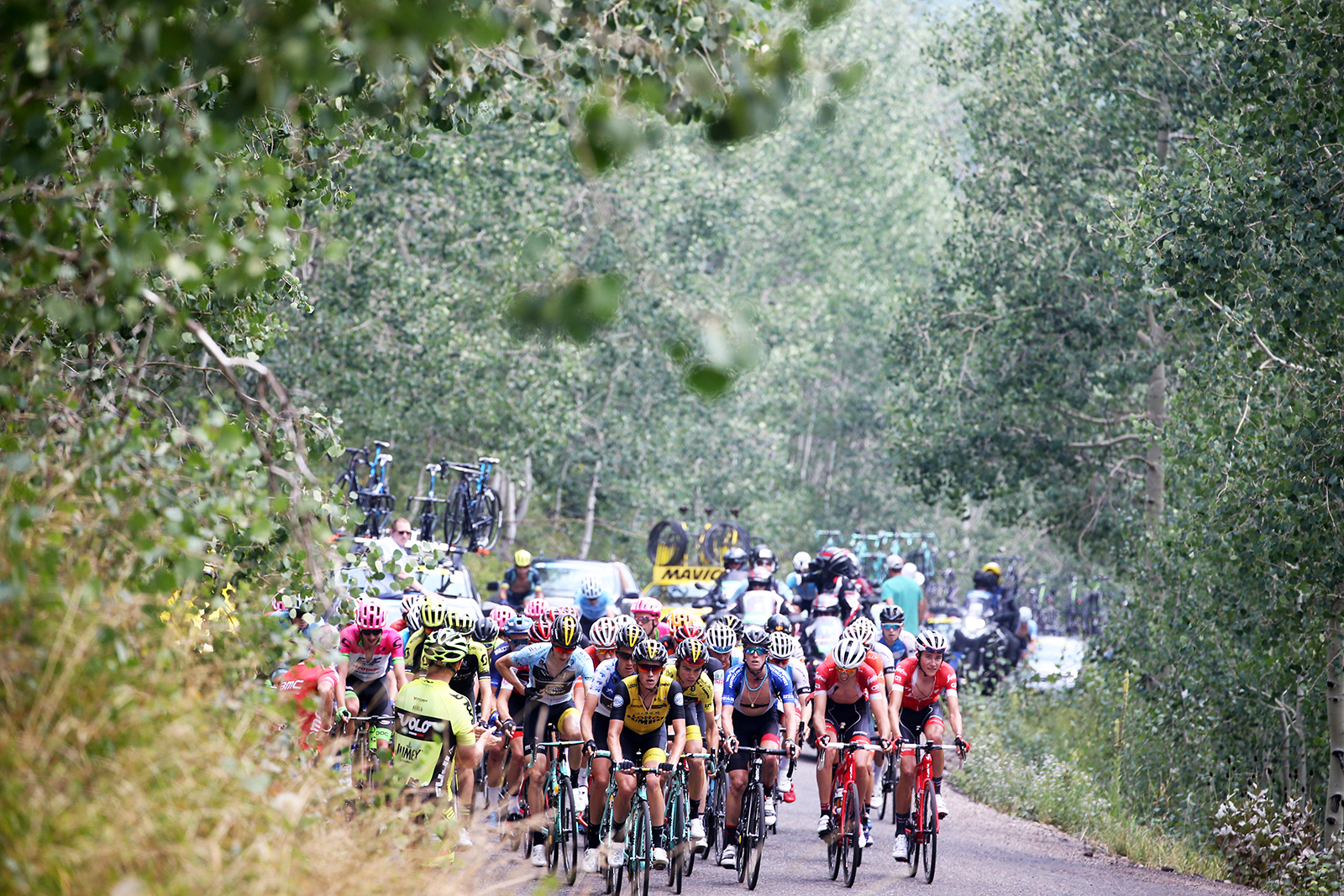 The peloton starts to close the gap.  Stage 5 of the 2018 Tour of Utah, August 10, 2018. Photo by Cathy Fegan-Kim, www.cottonsoxphotography.net