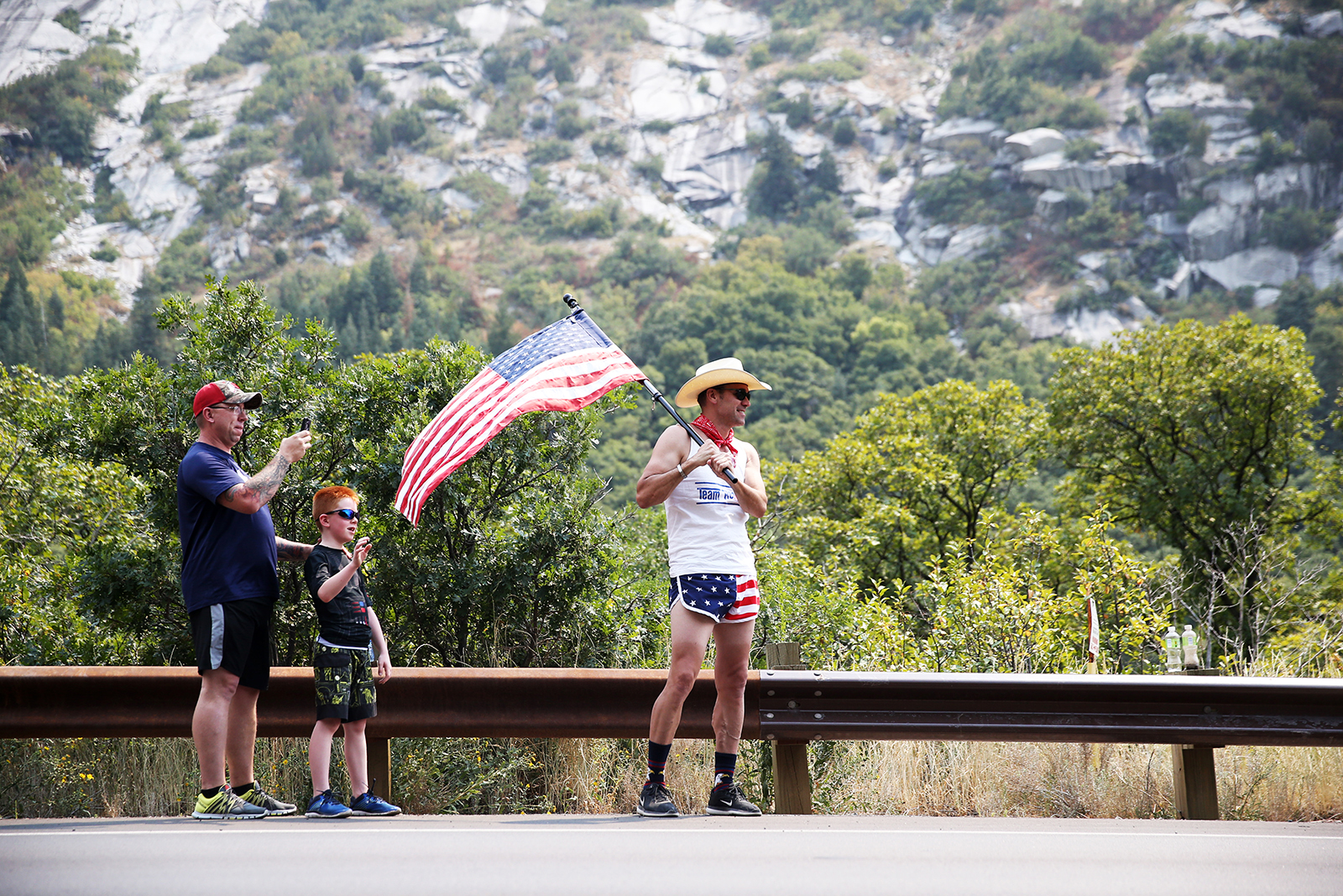 A patriotic fan up in Little Cottonwood Canyon.  Stage 5 of the 2018 Tour of Utah, August 10, 2018. Photo by Cathy Fegan-Kim, www.cottonsoxphotography.net