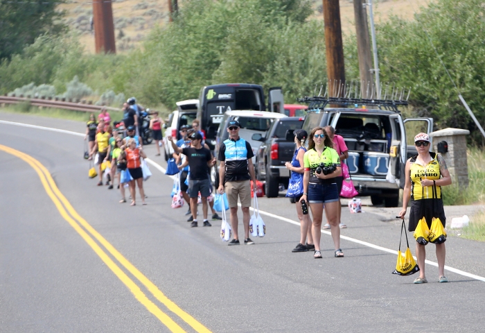 Team soigneurs ready for the riders to pass through the Feed Zone.  Stage 5 of the 2018 Tour of Utah, August 10, 2018. Photo by Cathy Fegan-Kim, www.cottonsoxphotography.net