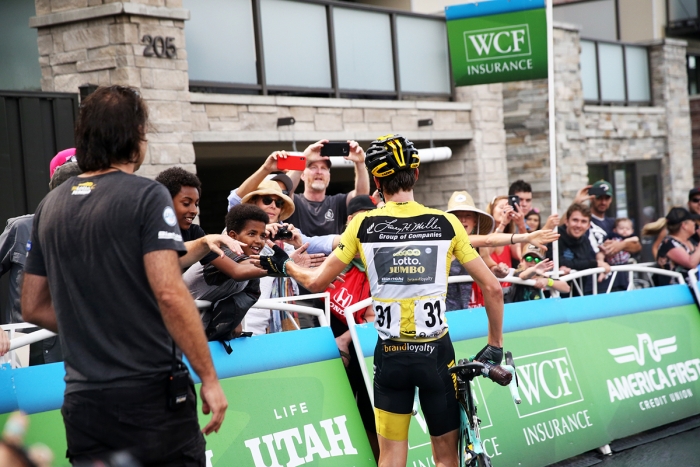 Sepp Kuss walks over to the specatator area to enjoy the win with his friends.2018 Tour of Utah Stage 6, August 12, 2018, Park City, Utah. Photo by Cathy Fegan-Kim, cottonsoxphotography.net