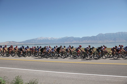 The peloton rides by Utah Lake in Stage 2. Photo by: Cottonsoxphotography.com.