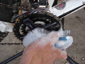 Use your dirty brush on the chain rollers