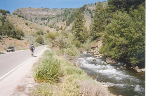 With the Logan River rushing to his right, a rider ascends Logan Canyon