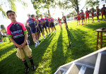 Local Cedar City boy and the Lampre-Merida team line up by the stage for Team Presentation. Photo by Cottonsoxphotography.com