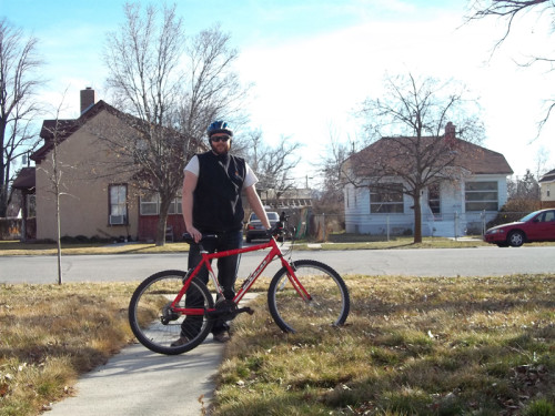 Aaron Na and his recently retired commuter bike. Photo courtesy Aaron Na.