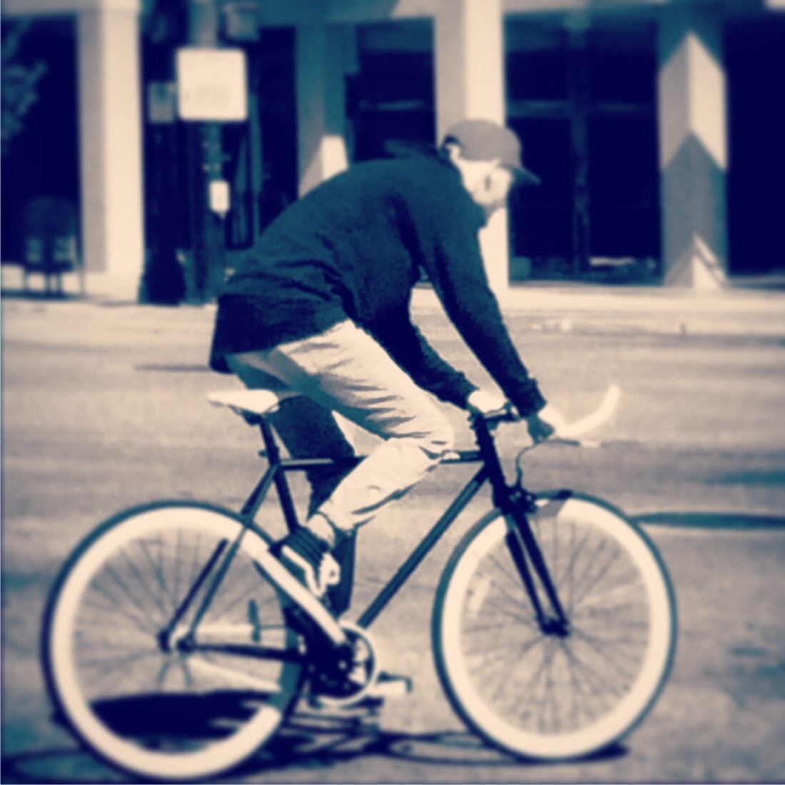 A fixed gear cyclist rides through downtown Salt Lake City, Utah on March 22, 2015. Photo by Dave Iltis