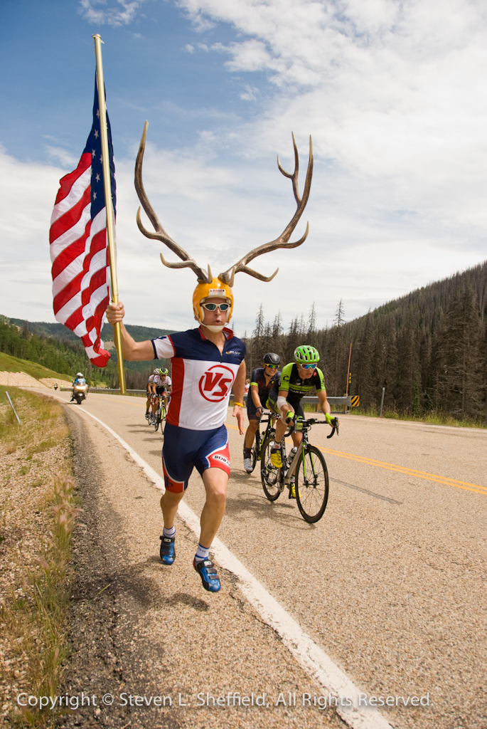 Antler Man running with the break at Wolf Creek Pass in stage 4 of the 2015 Tour of Utah. Photo by Steven Sheffield