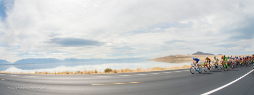 The peloton rolls out from Antelope Island State Park with the Great Salt Lake and the Wasatch Mountains in the background, Stage 3 2015 Tour of Utah daverphoto.com