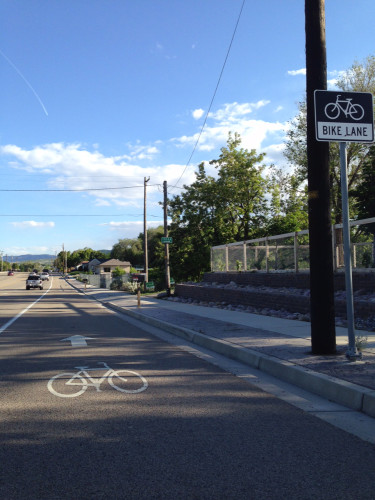 Redwood Road is part of the Wasatch Front Regional Council's Bicycle Priority Network. This section, south of Bangerter Highway has bike lanes. UDOT is proposing to remove lanes from 10440 S to 12600 S. Photo by Lisa Hazel