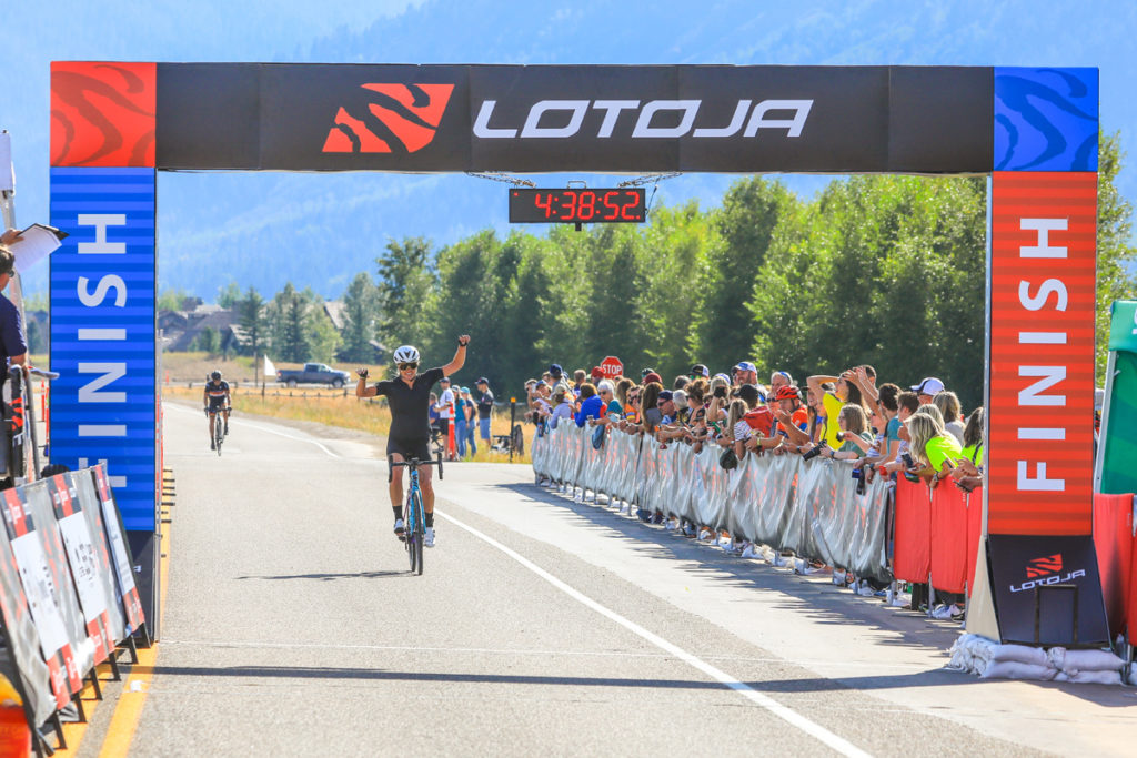 Alison Tetrick (Specialized) acknowledges the cheering crowd after winning the Women's Pro 123 race in the 37th Annual LoToJa Classic held on September 7, 2019. Tetrick finished the 202-mile course in 9:42:07. Photo courtesy of Snake River Photo