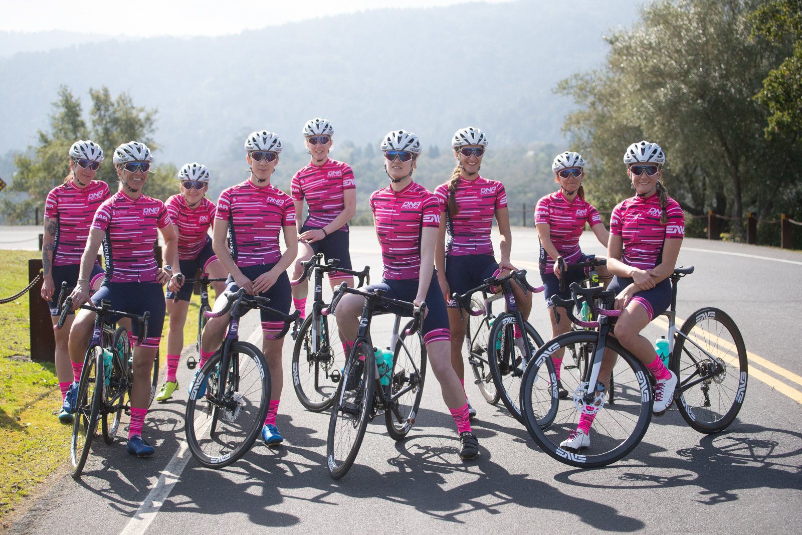 The 2021 DNA Pro Cycling Team (L-R): Kimberly Lucie, Liza Rachetto, Maggie Coles-Lyster, Heather Fischer, Brenna Wrye-Simpson, Margot Clyne, Hanna Muegge, Sarah Kaufmann, and Katie Clouse. Not pictured: Mia Kilburge, Erica Clevenger, Nicole Shields. Photo by Catherine Fegan-Kim