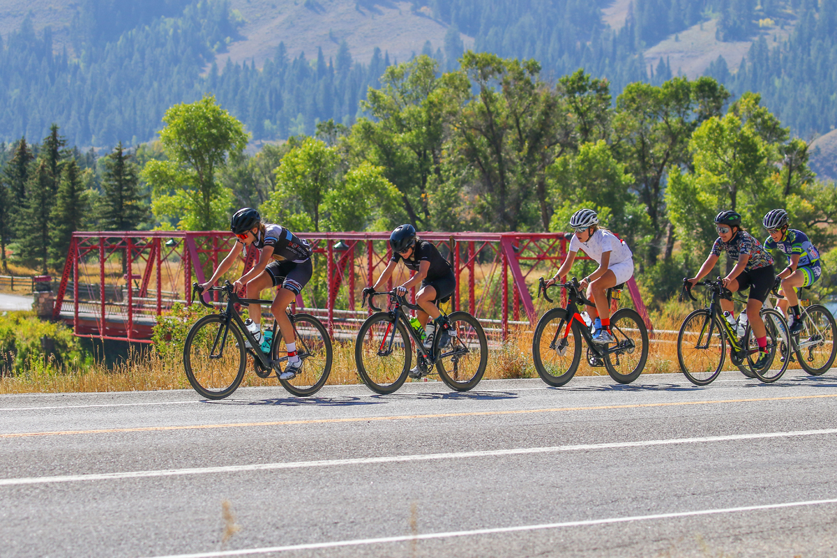A peloton of women cyclists work a pace line along the Snake River a few miles south of Hoback Junction, Wyoming, in the 38th annual LoToJa Classic on Sept. 12. A total of 41 licensed women cyclists ranging from Pro 123s to Women’s Master 45+ Open competed in the race. Photo courtesy of Snake River Photo.