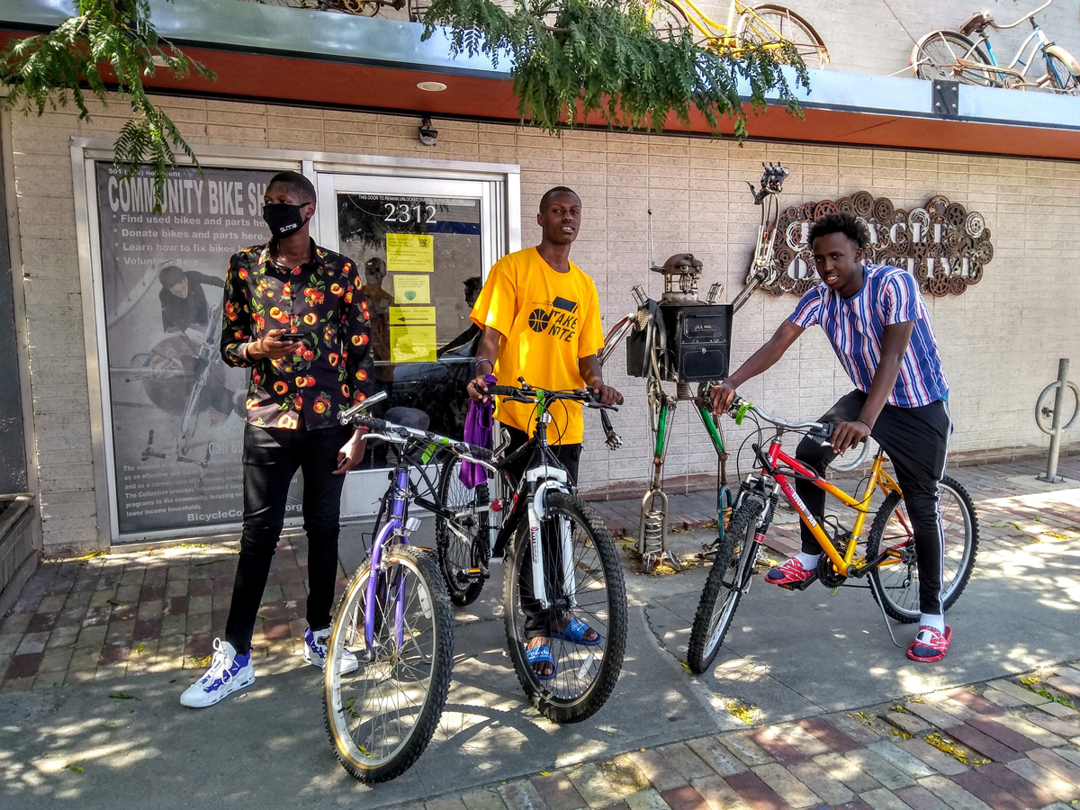 International Rescue Committee clients with bikes at the Salt Lake Bicycle Collective. Photo by Essen Skabelund