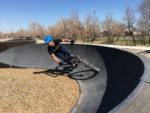 The author railing the berms at the West Valley pump track. Photo by Erik Reid