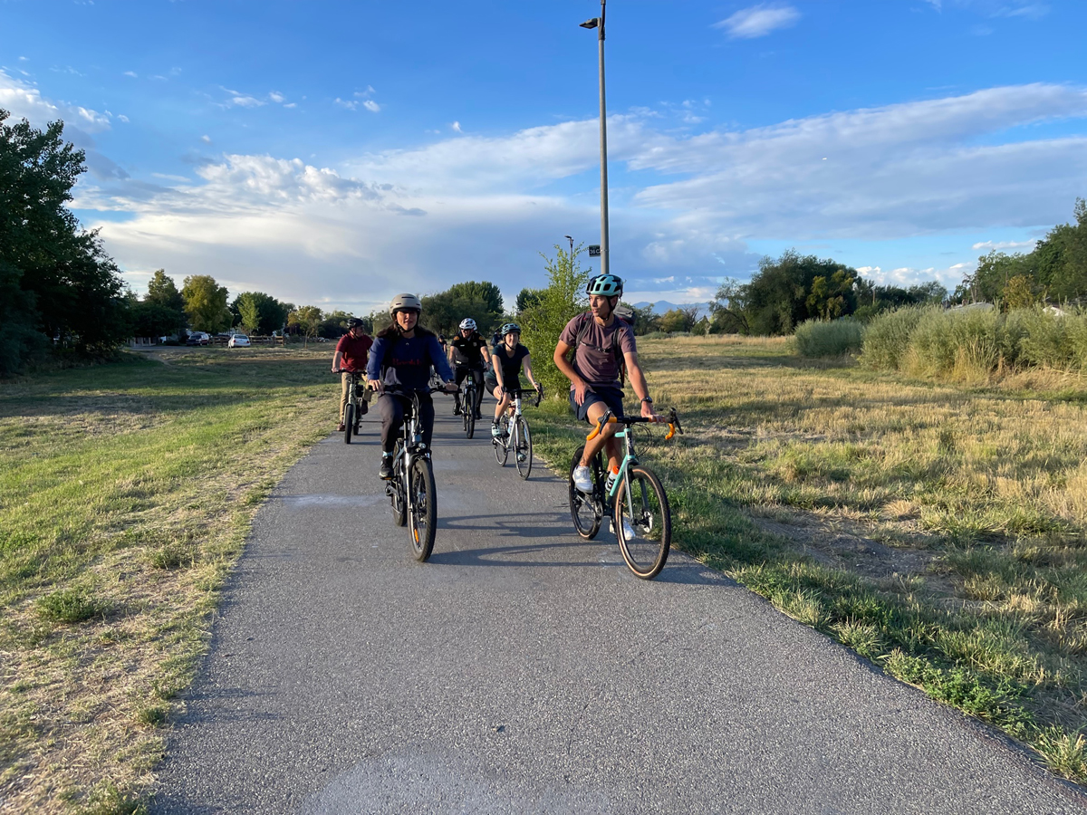 Salt Lake City Mayor Mendenhall (left) leads the Mayor's Bike to Work Day in the fall of 2022 on the Jordan River Parkway. Photo by Dave Iltis