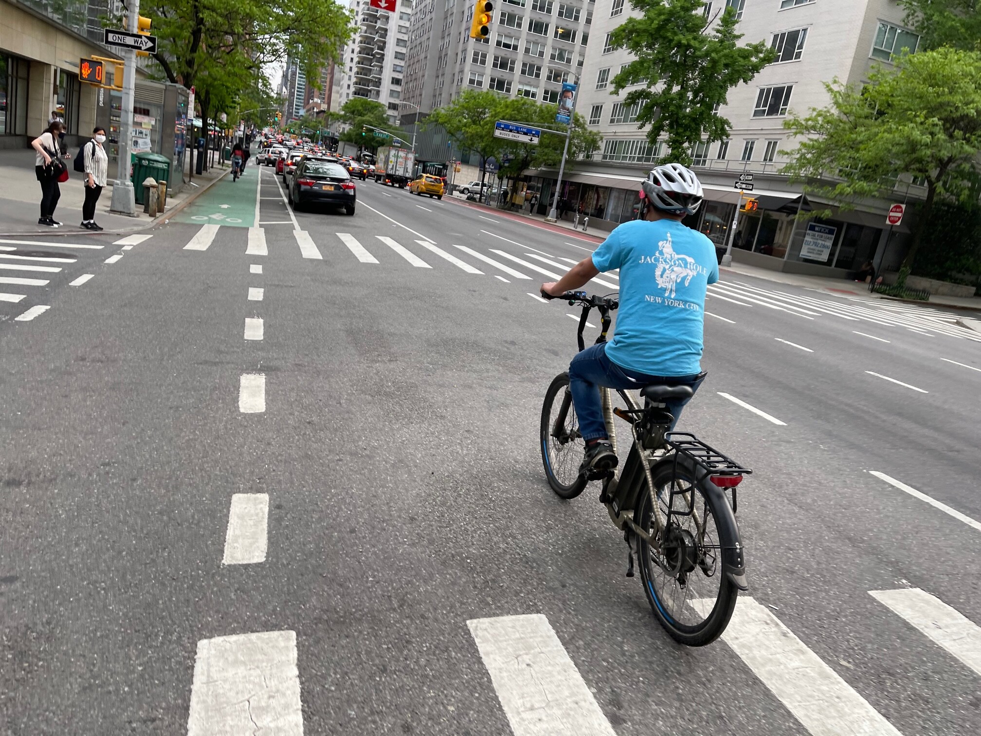 A New York City cyclist. A new study shows that drivers see helmeted cyclists as subhuman. Photo by Dave Iltis
